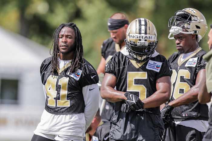 New Orleans Saints running backs Alvin Kamara (41) and Mark Ingram II (5) looks on during training camp at Ochsner Sports Performance Center. Mandatory Credit: Stephen Lew-USA TODAY Sports